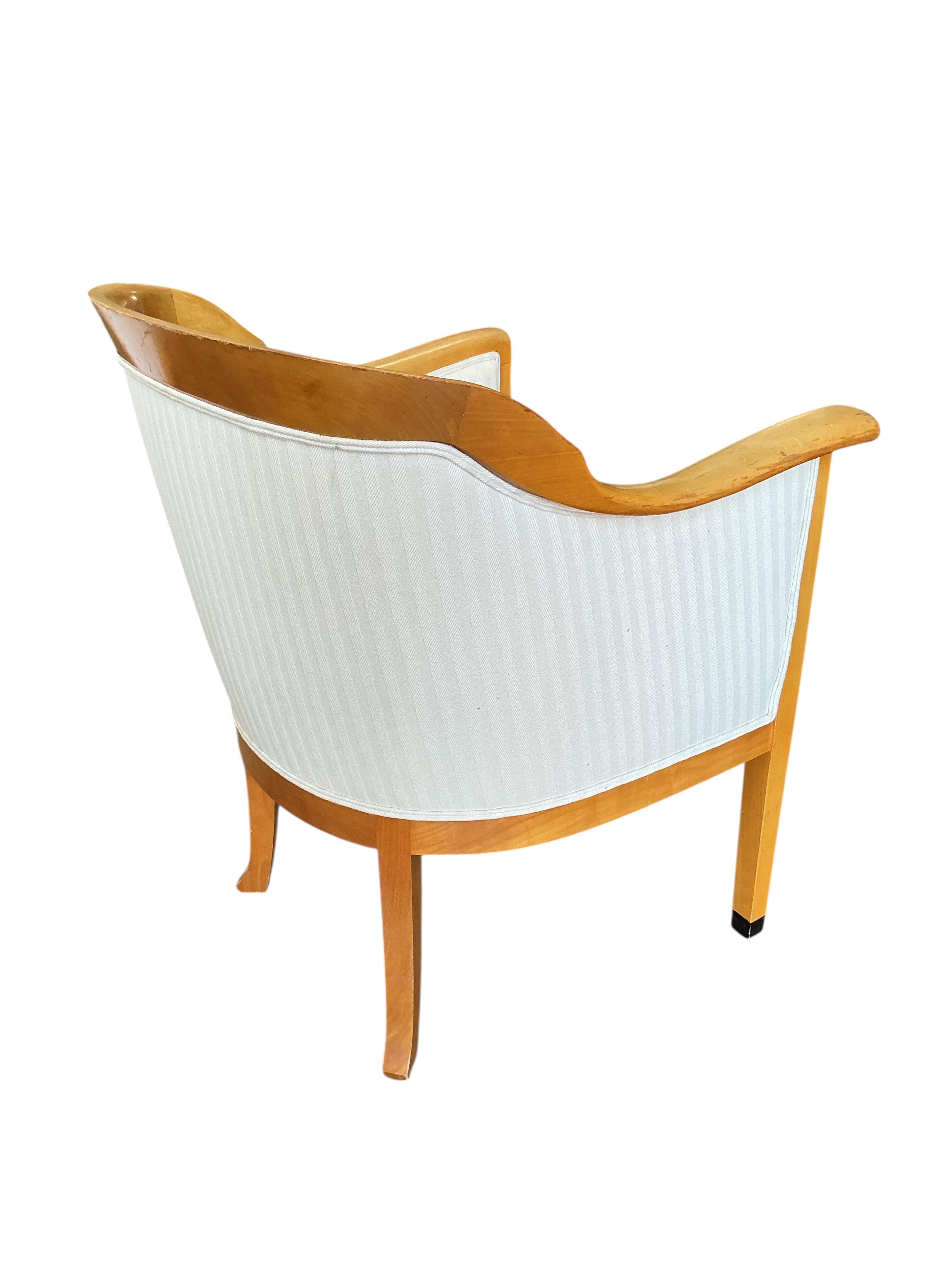 A pair of Contemporary OKA upholstered armchairs, width 69cm, depth 60cm, height 85cm